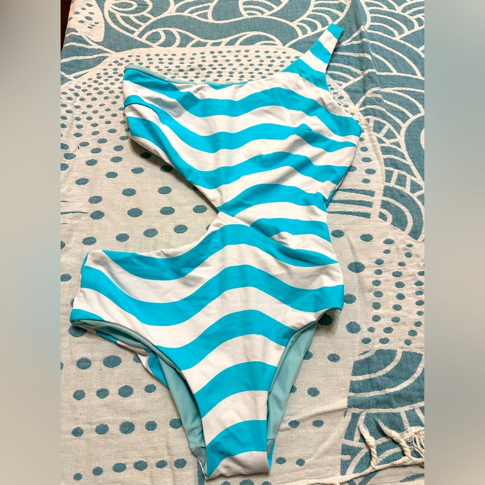 Solid & Striped reversible, one-shouldered one piece with cut out. Size M